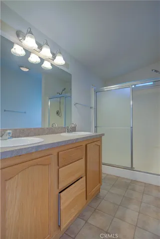 a view of a room with wooden shelves