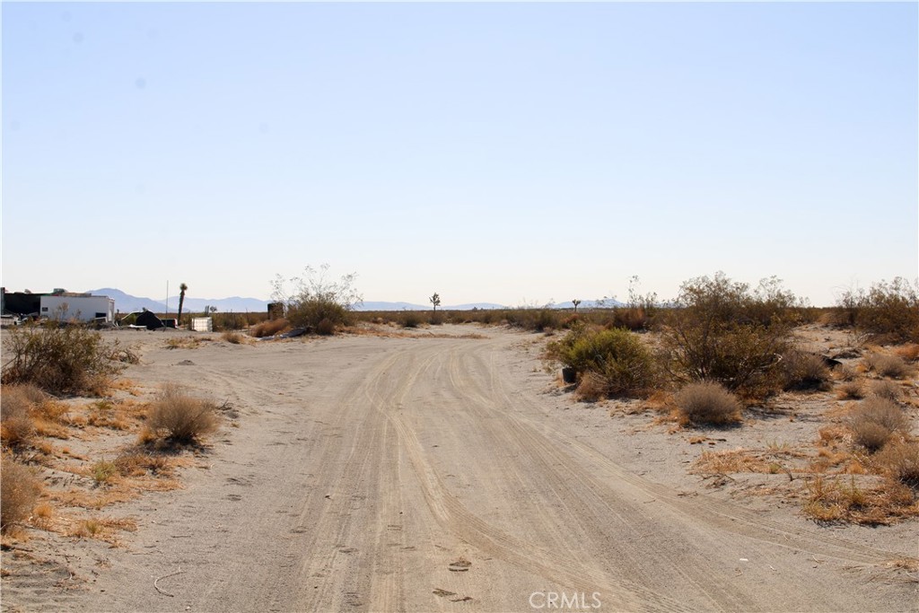 5-ac Sheep Creek Road Phelan, CA 92371 - Photo 10 of 12 a view of a lake with a beach