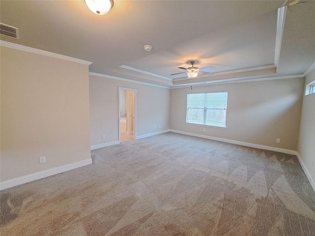 512 Hinton Farm Wy. Way Dacula, GA 30019 - Photo 21 of 30 a view of a room with a ceiling fan and a window