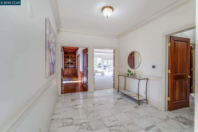 a spacious bedroom with a large bed and a large window