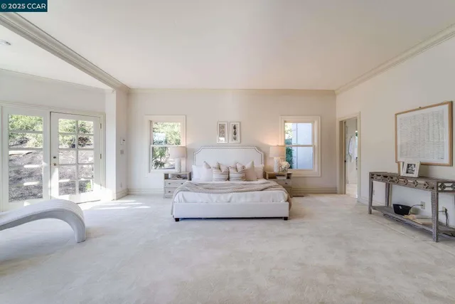 a view of entryway with natural light and hardwood