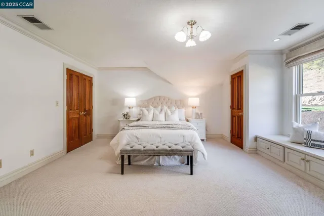 a backyard of a house with fire pit and furniture