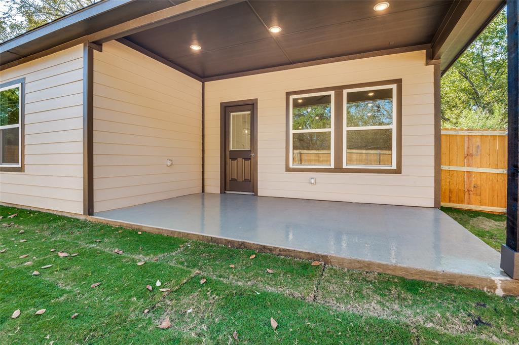 608 Southwest 3rd Street Kerens, TX 75144 - Photo 21 of 25 View of exterior entry featuring a patio