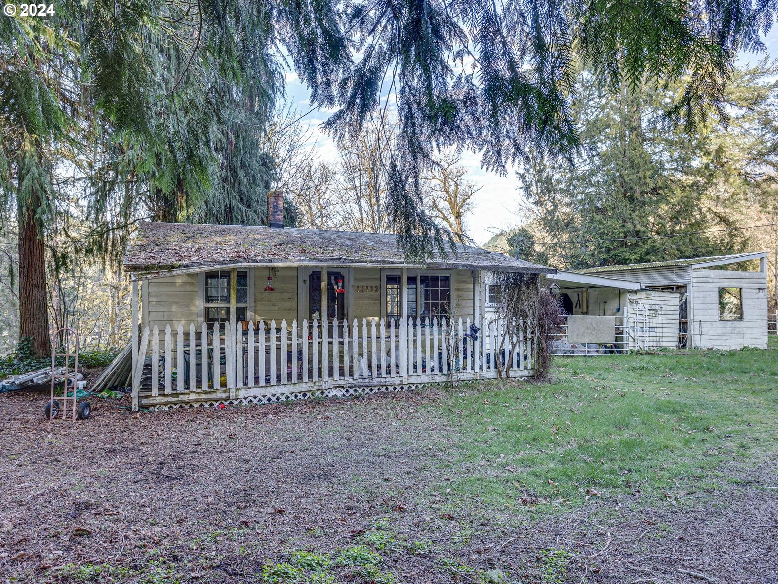 11112 Southeast Lusted Road Sandy, OR 97055 - Photo 1 of 21 a view of a house with a yard and fence