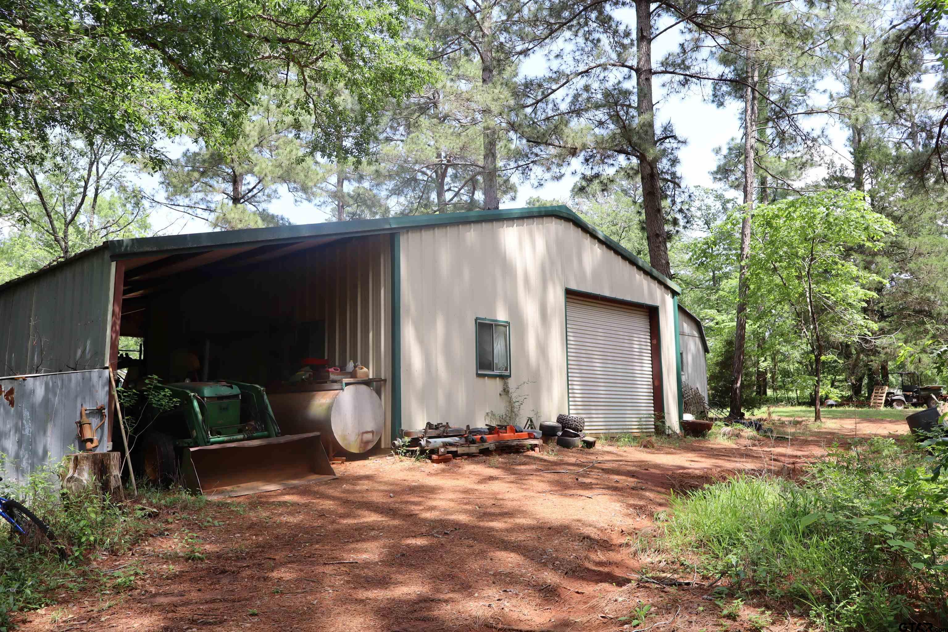 4269 Highway 21 Alto, TX 75925 - Photo 31 of 41 a backyard of a house with yard and outdoor seating