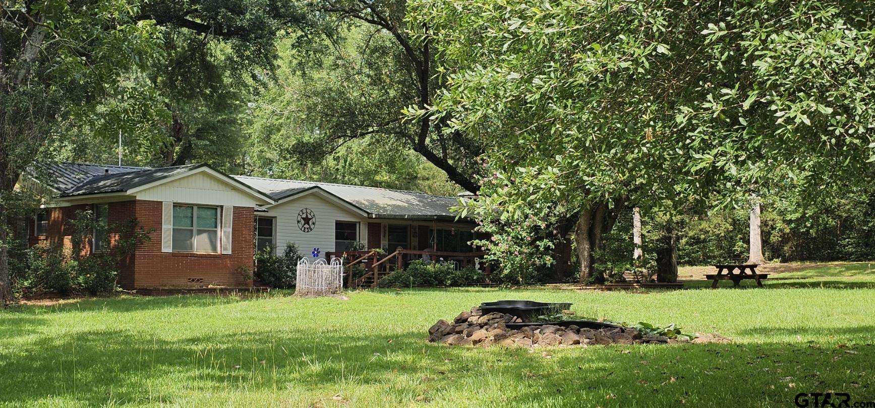 4269 Highway 21 Alto, TX 75925 - Photo 41 of 41 a front view of a house with a garden