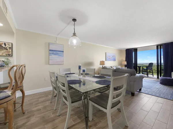 a view of a dining room with furniture