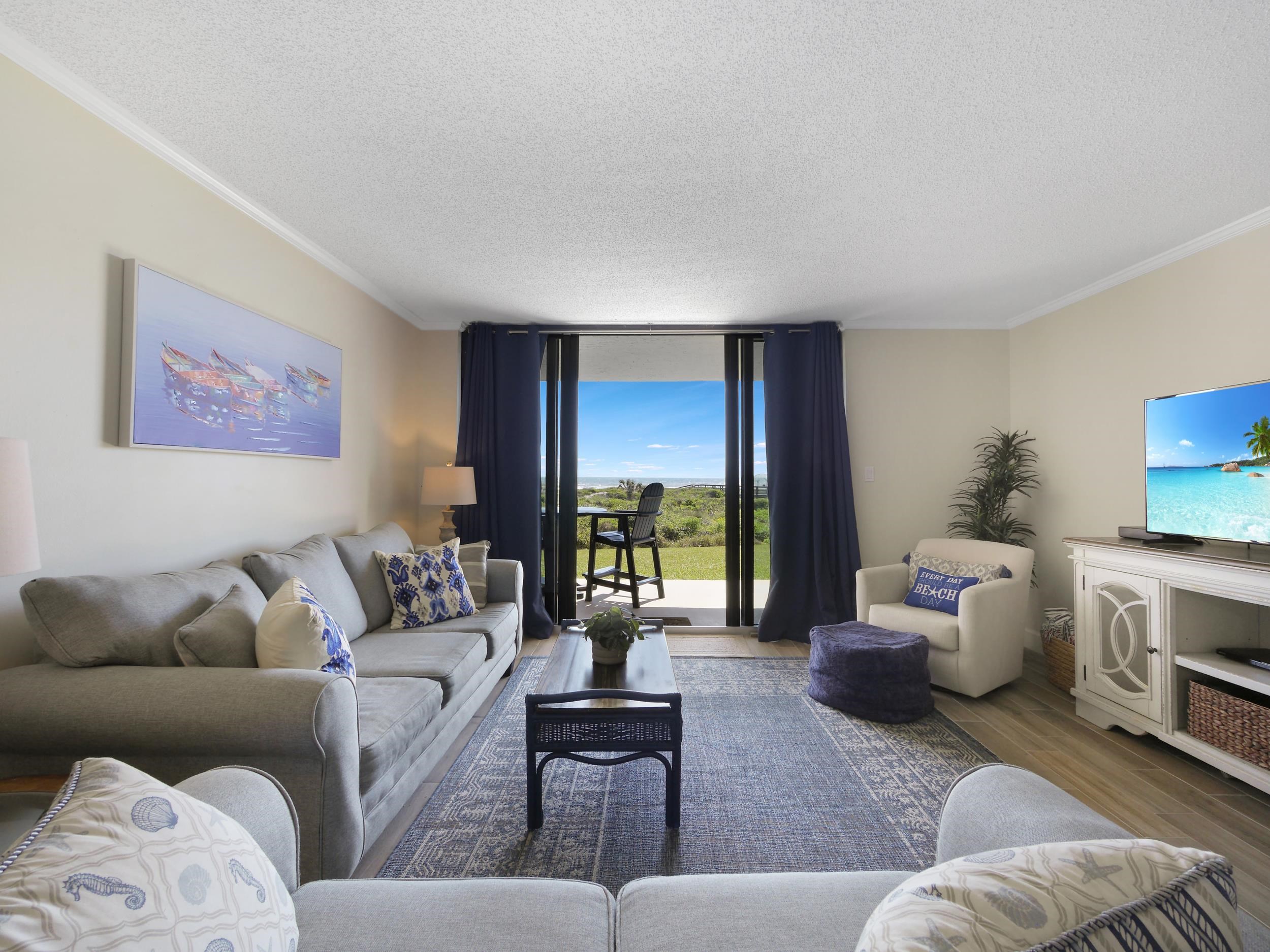 6240 A1A South St. Augustine, FL 32080 - Photo 19 of 44 a living room with furniture and a fireplace