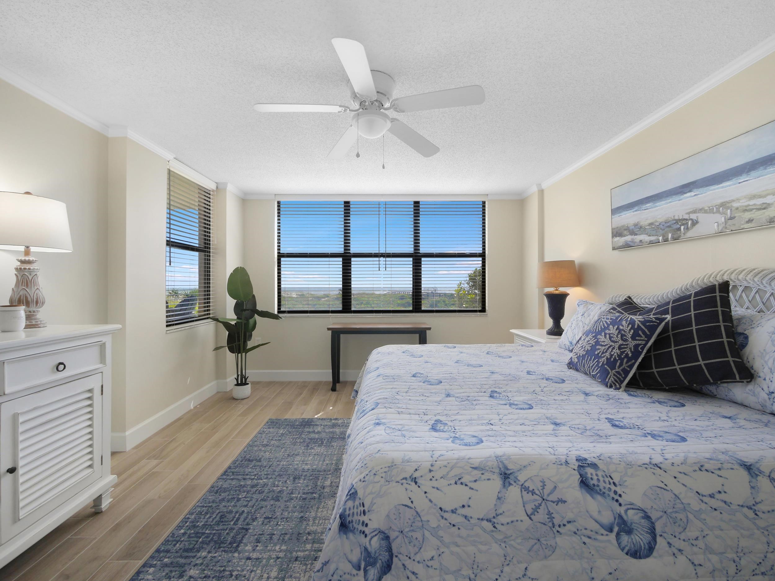 6240 A1A South St. Augustine, FL 32080 - Photo 26 of 44 a spacious bedroom with a large bed and a window