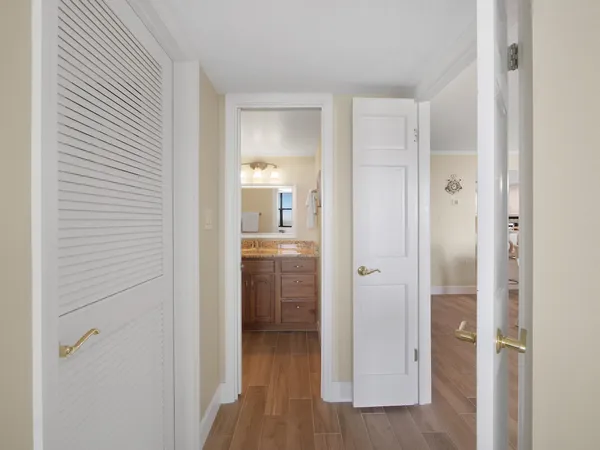 a view of a bathroom from the hallway