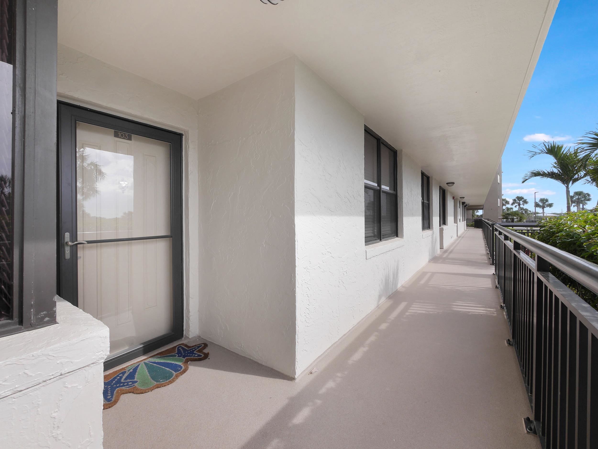 6240 A1A South St. Augustine, FL 32080 - Photo 3 of 44 a view of a hallway to a livingroom with furniture