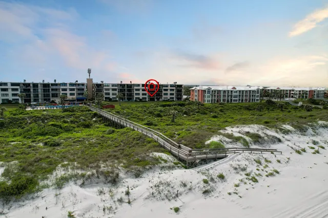 a view of a houses with a yard
