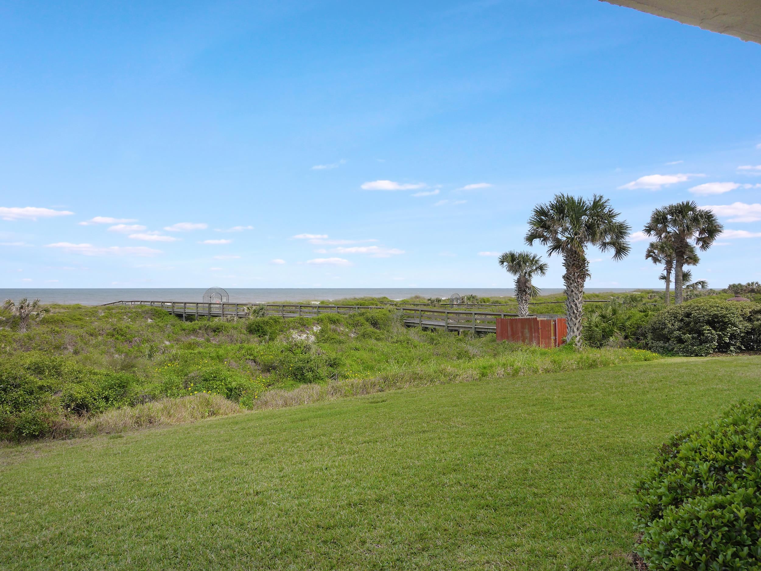 6240 A1A South St. Augustine, FL 32080 - Photo 41 of 44 a view of an ocean and a yard