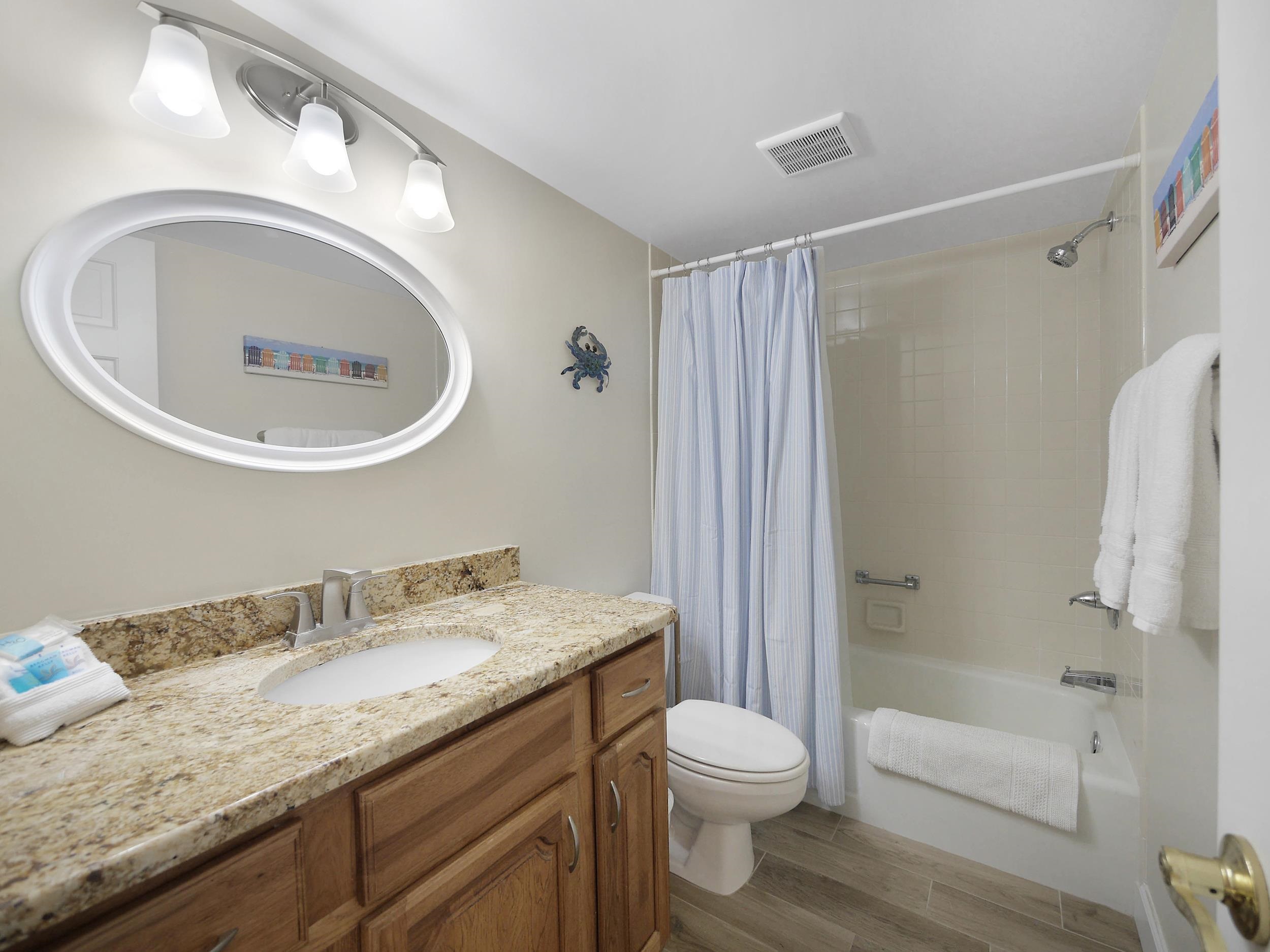 6240 A1A South St. Augustine, FL 32080 - Photo 10 of 44 a bathroom with a granite countertop sink toilet and shower