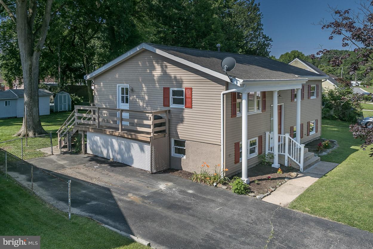 3715 Holly Grove Road Baltimore, MD 21220 - Photo 3 of 30 Side Porch and Long Driveway with Ample Parking.