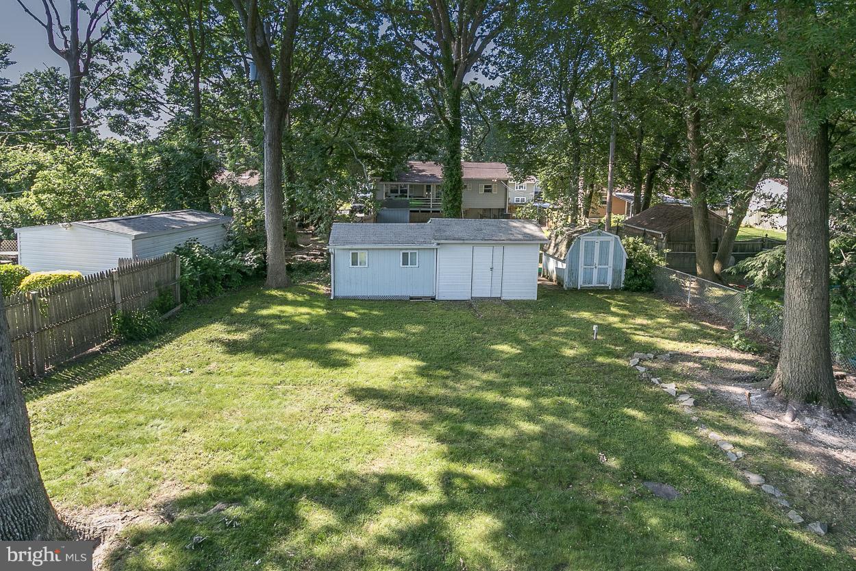3715 Holly Grove Road Baltimore, MD 21220 - Photo 5 of 30 Relax in the Peaceful backyard with mature trees.