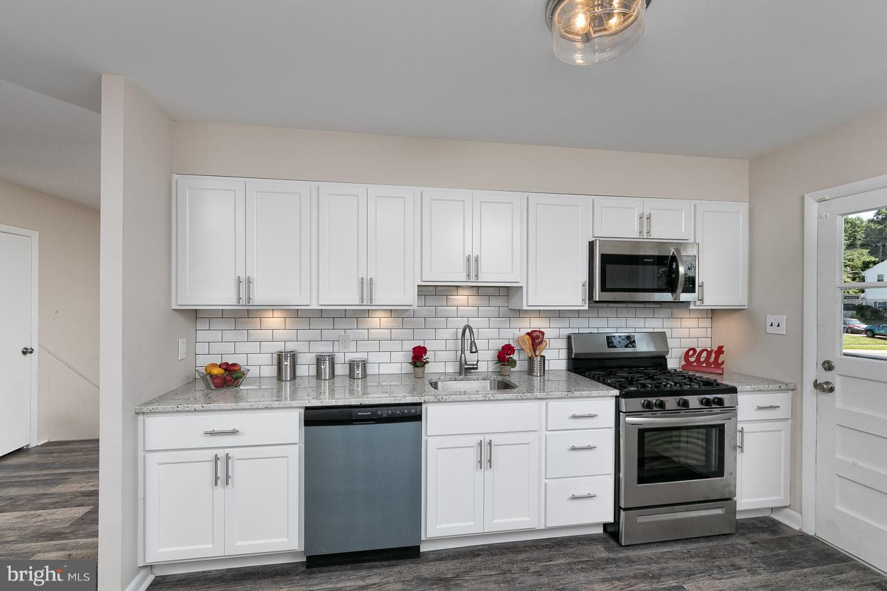 3715 Holly Grove Road Baltimore, MD 21220 - Photo 8 of 30 Gourmet Chef's Kitchen w/ granite and subway tile!