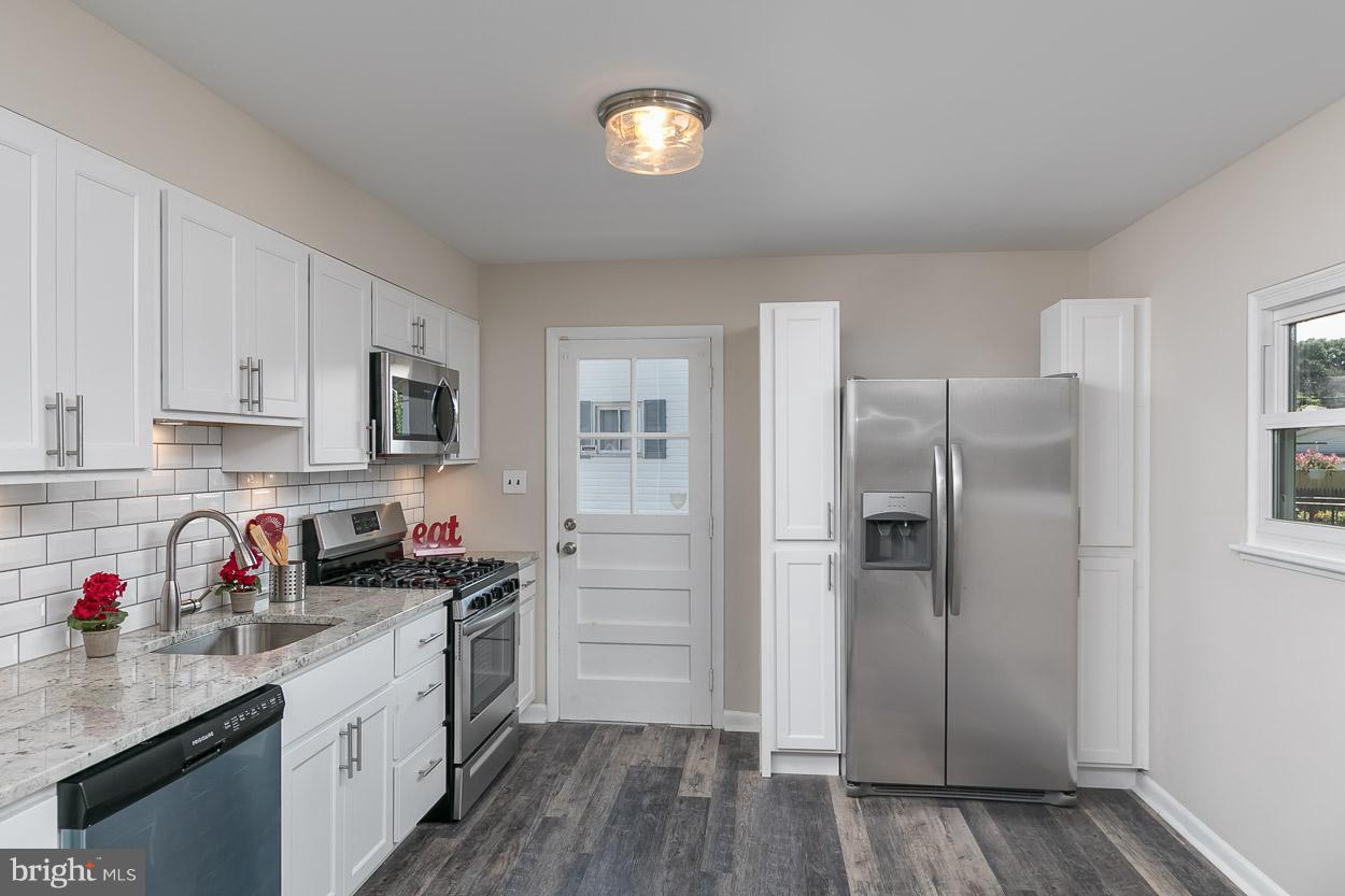 3715 Holly Grove Road Baltimore, MD 21220 - Photo 9 of 30 New SS Appliances and Under Cabinet Lighting
