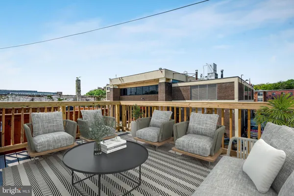 a outdoor living space with patio furniture