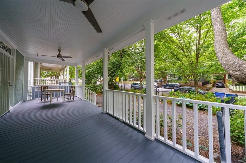 693 Myrtle Street Northeast, Unit 2 Atlanta, GA 30308 - Photo 4 of 17 a view of a porch with wooden floor and outdoor space