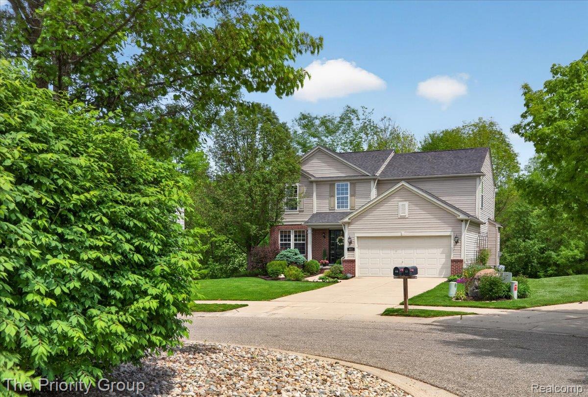 517 Deer Valley Road Holly, MI 48442 - Photo 3 of 61 Set back on the cul-de-sac with mature trees as a backdrop!