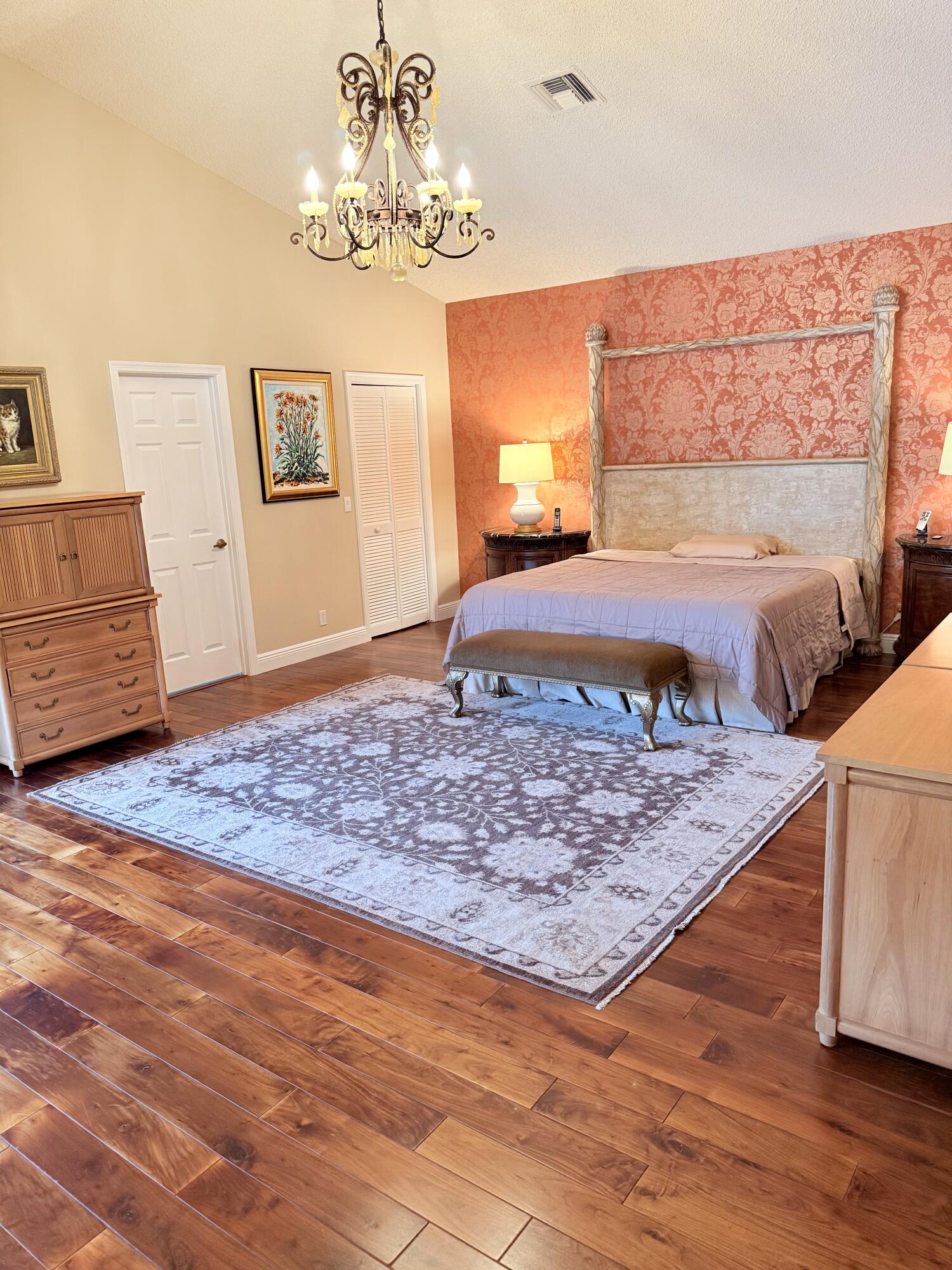 7633 La Corniche Circle Boca Raton, FL 33433 - Photo 30 of 49 a view of a bedroom with wooden floor