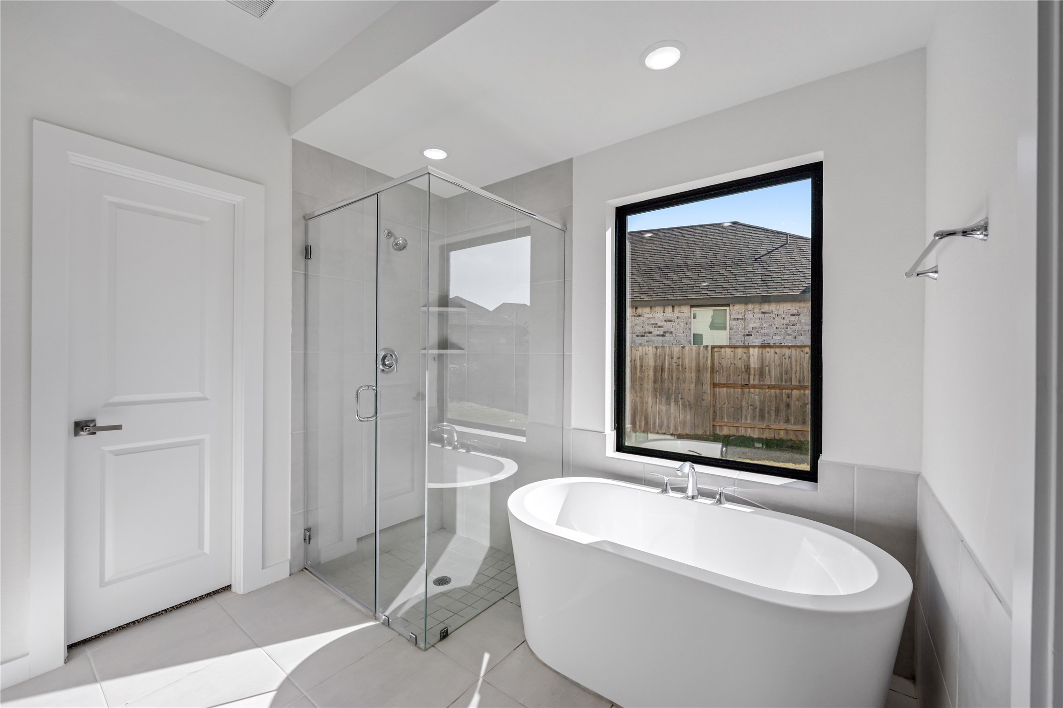 5106 Sistine Drive Manvel, TX 77578 - Photo 22 of 42 a bathroom with a bathtub and a shower