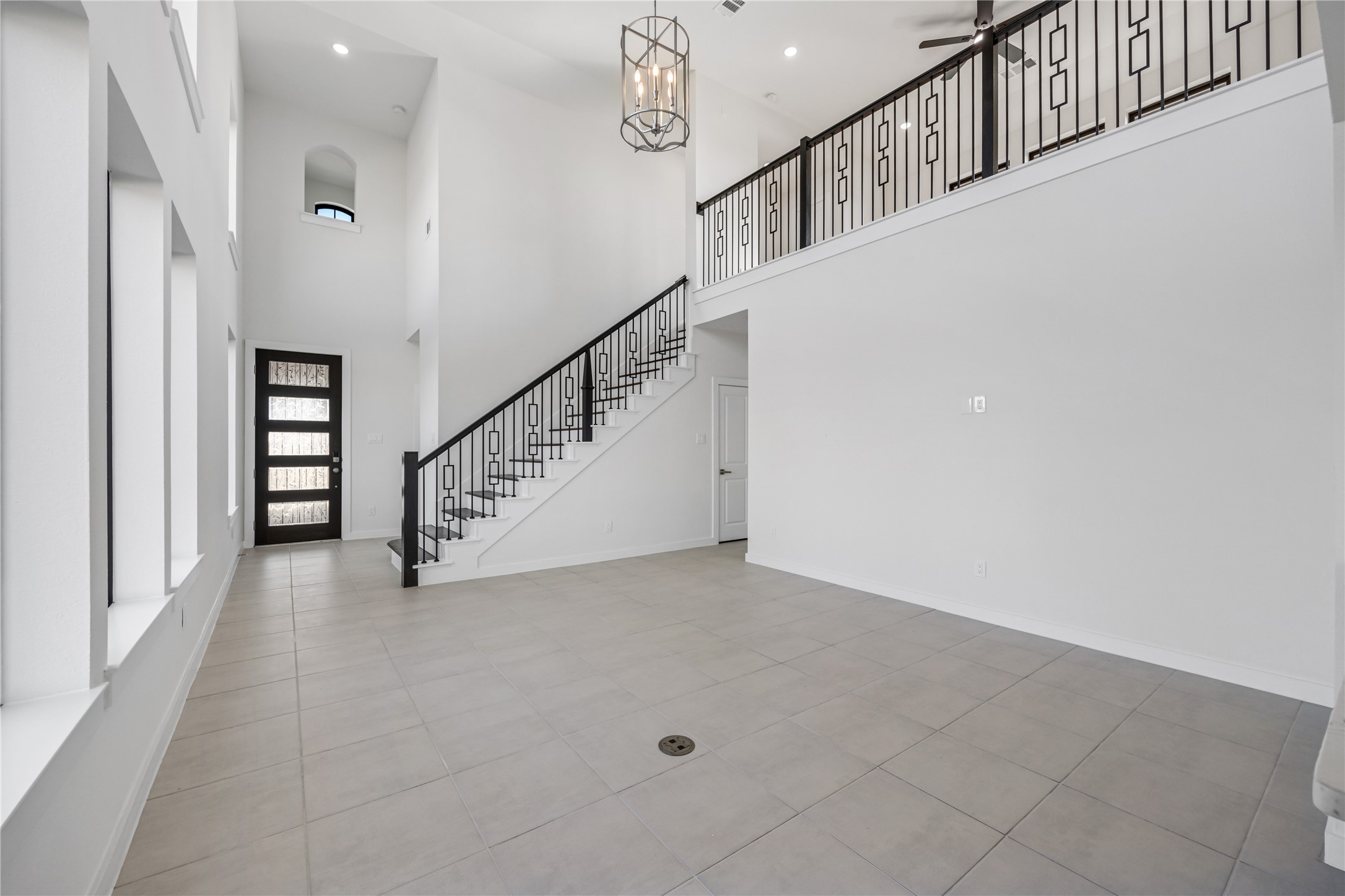 5106 Sistine Drive Manvel, TX 77578 - Photo 6 of 42 a view of entryway and hall with stairs