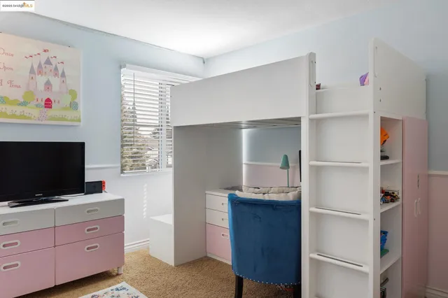 a room with furniture and flat screen tv