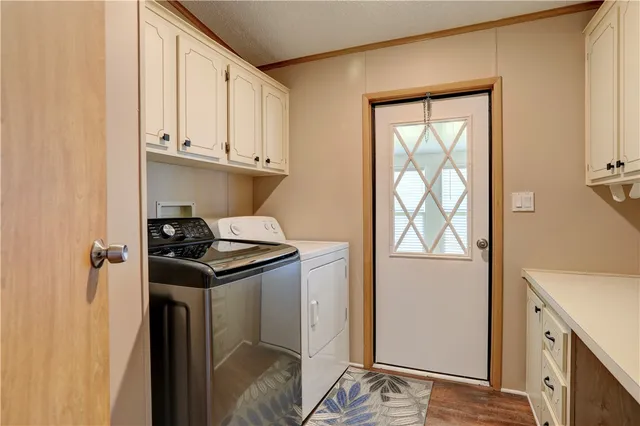 a kitchen with a sink and a refrigerator
