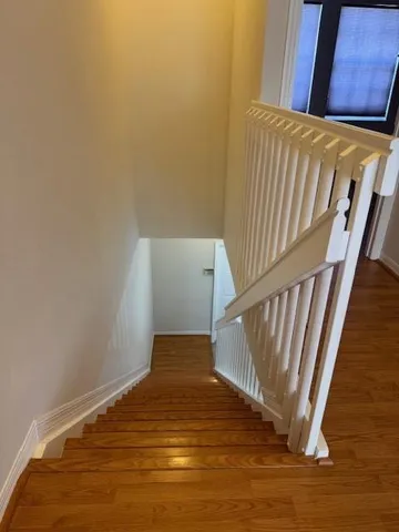 a view of entryway with wooden floor