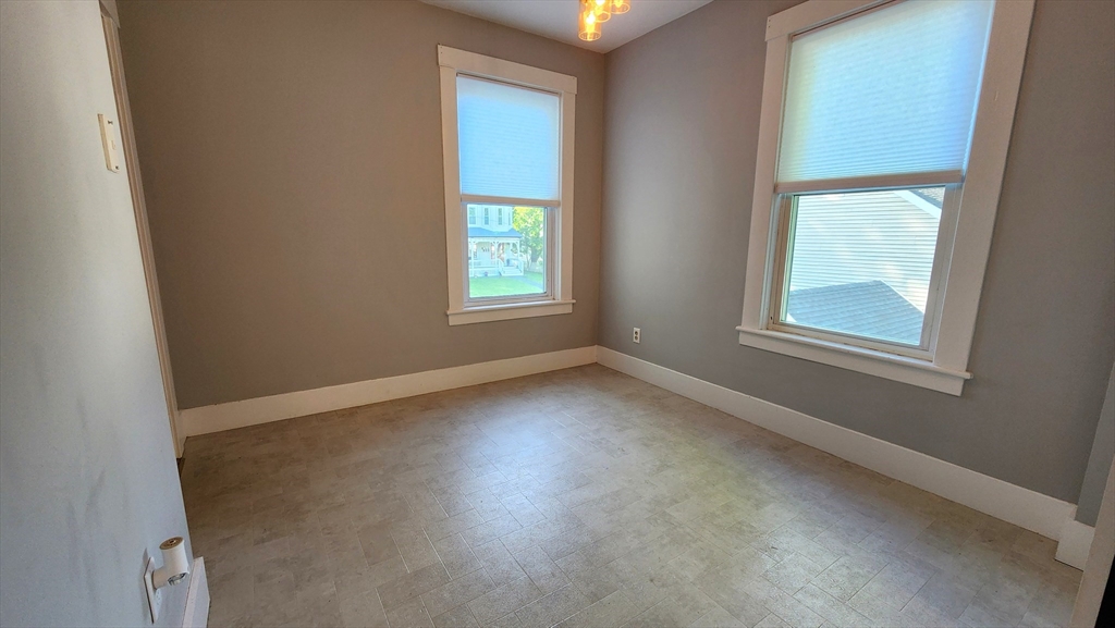 8 Fay Street, Unit 2 Westborough, MA 01581 - Photo 4 of 15 an empty room with a window