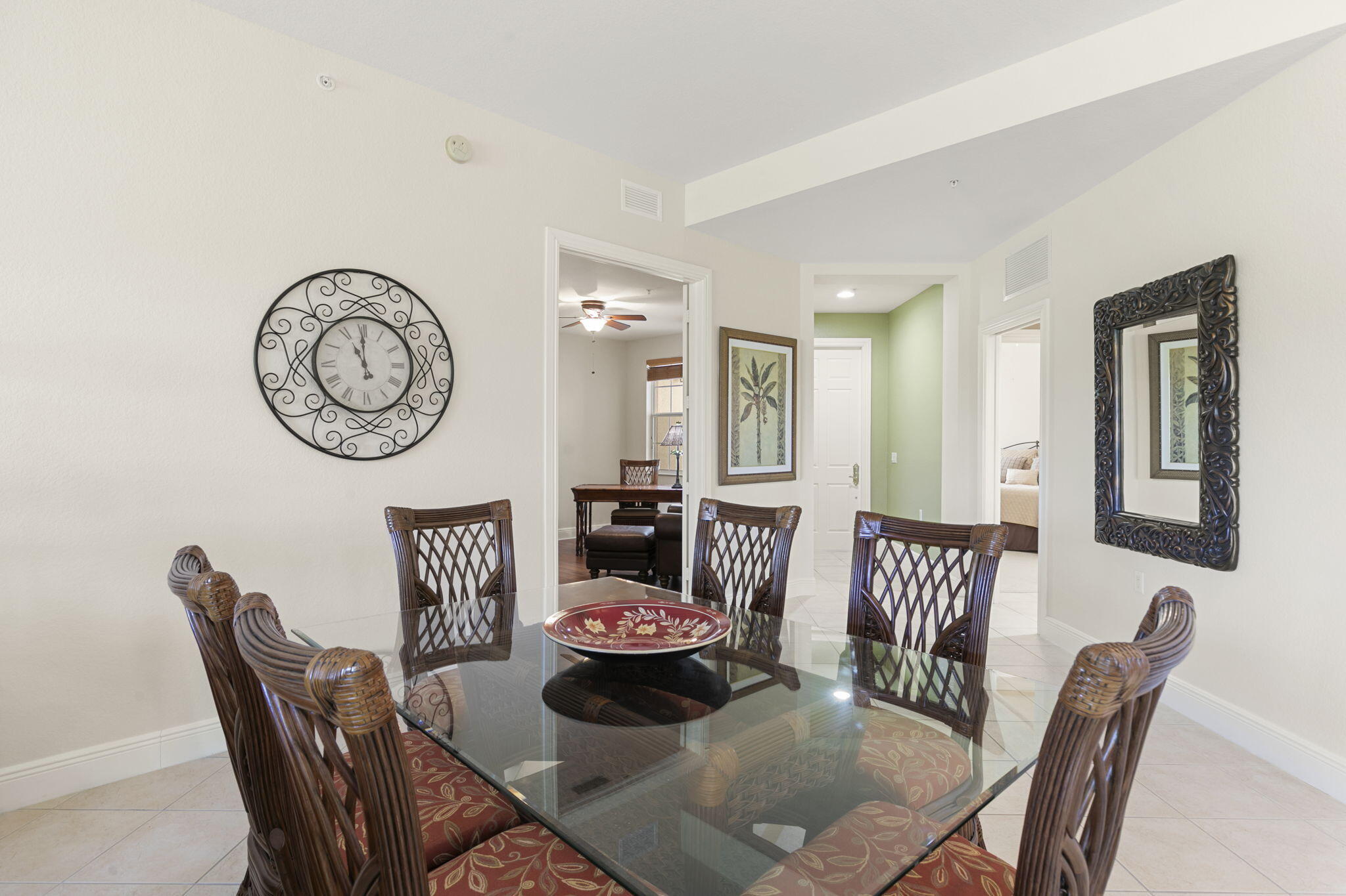 9066 Cascada Way, Unit 101 Naples, FL 34114 - Photo 6 of 51 a view of a dining room with furniture