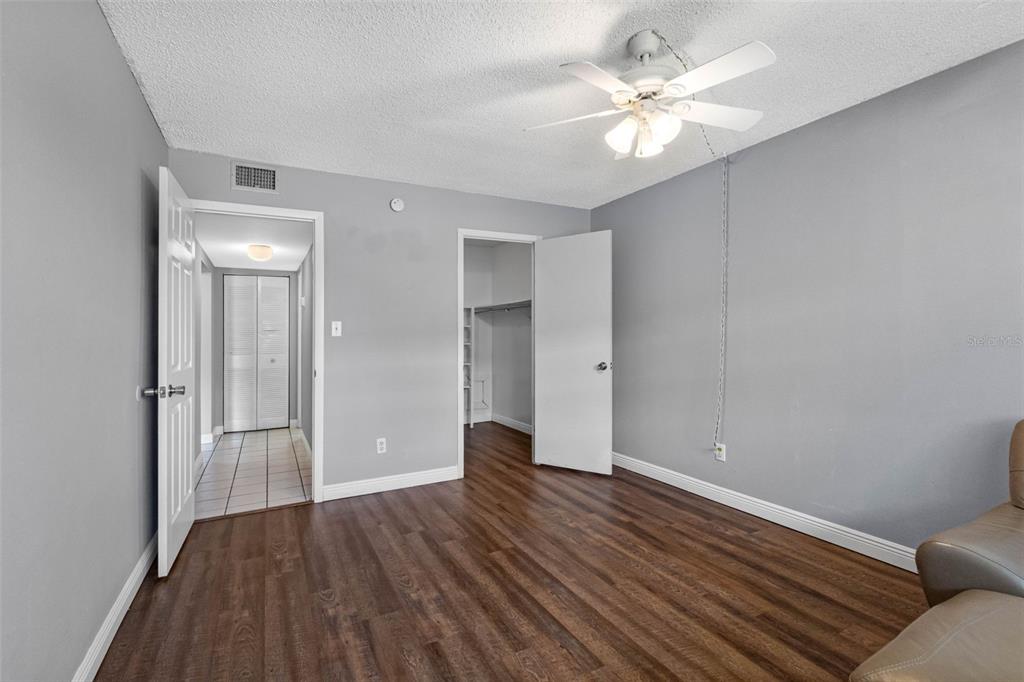 5820 North Church Avenue, Unit 346 Tampa, FL 33614 - Photo 12 of 30 wooden floor in an empty room with a window