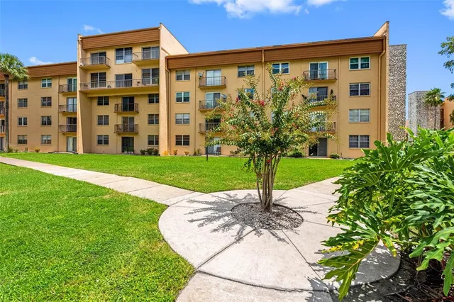 a view of a building with garden