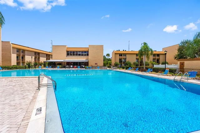 a view of a house with a swimming pool