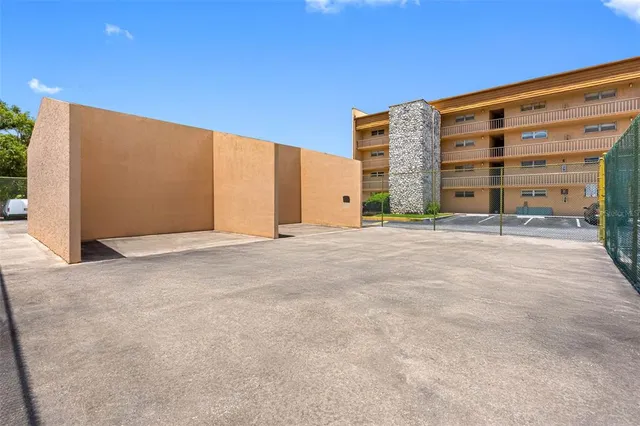 a view of an building with a road