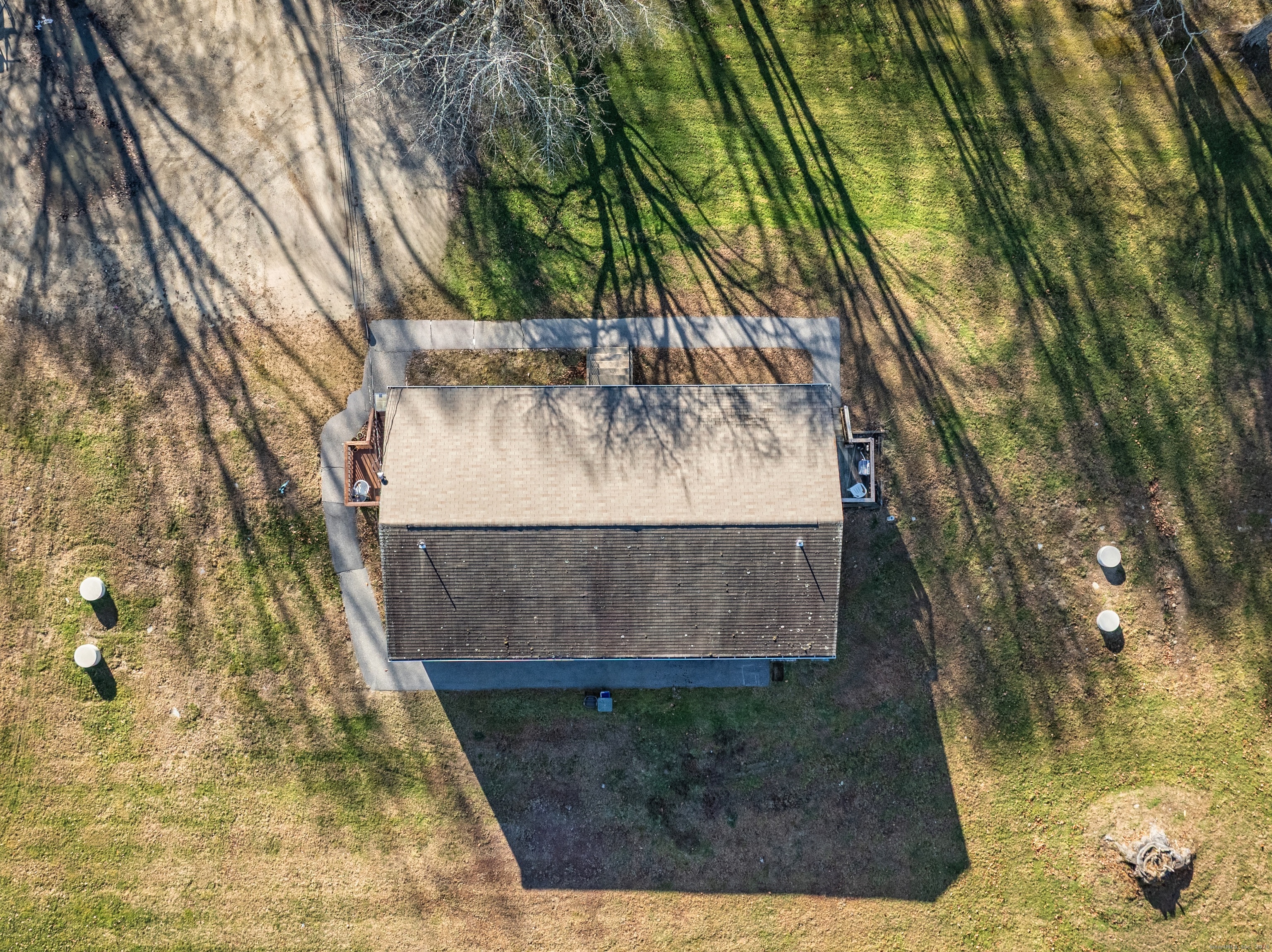 12 A White Oak Road, Unit 12A Mansfield, CT 06268 - Photo 18 of 24 a view of a yard with a tree