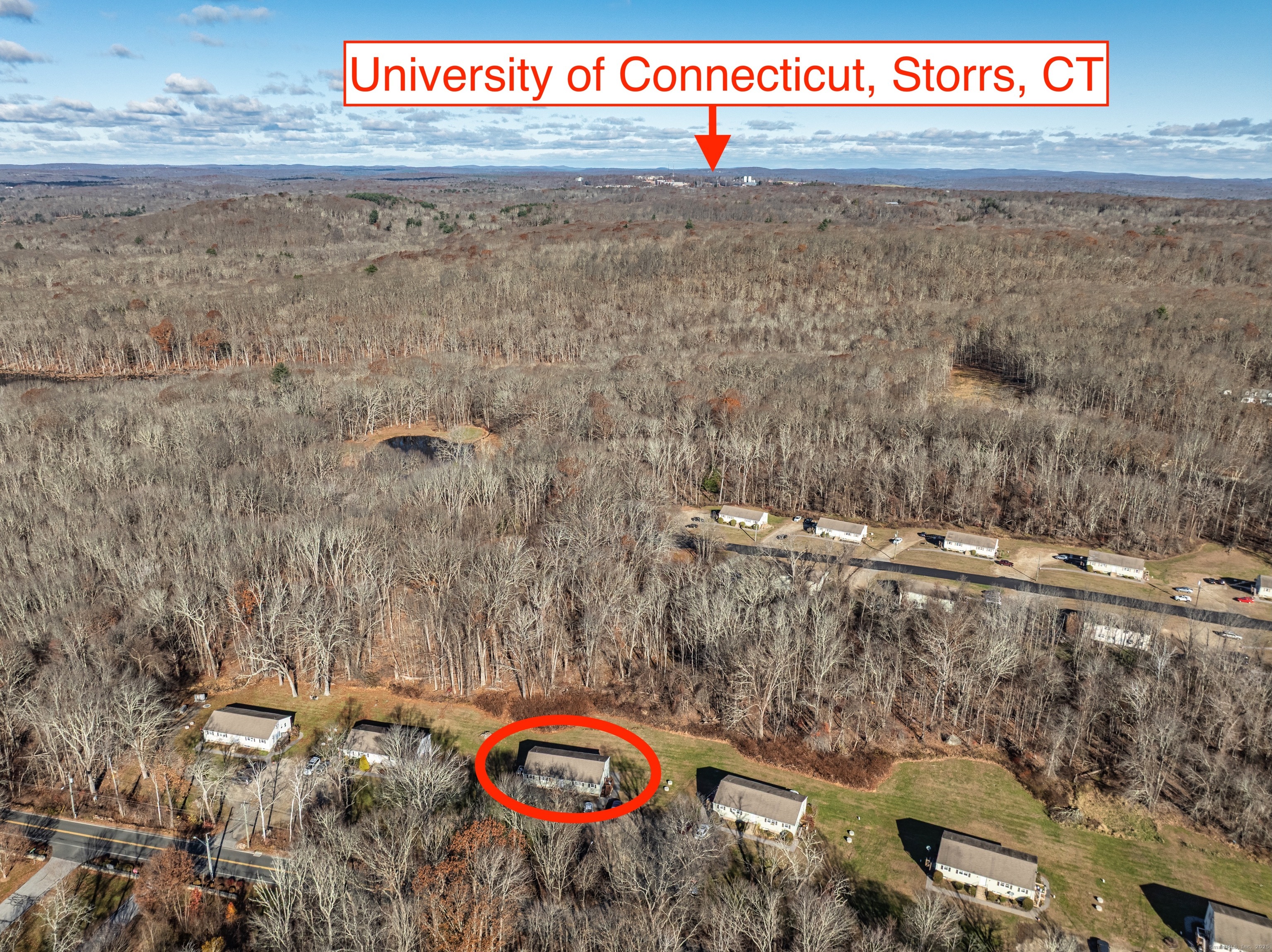 12 A White Oak Road, Unit 12A Mansfield, CT 06268 - Photo 20 of 24 a view of a street with trees