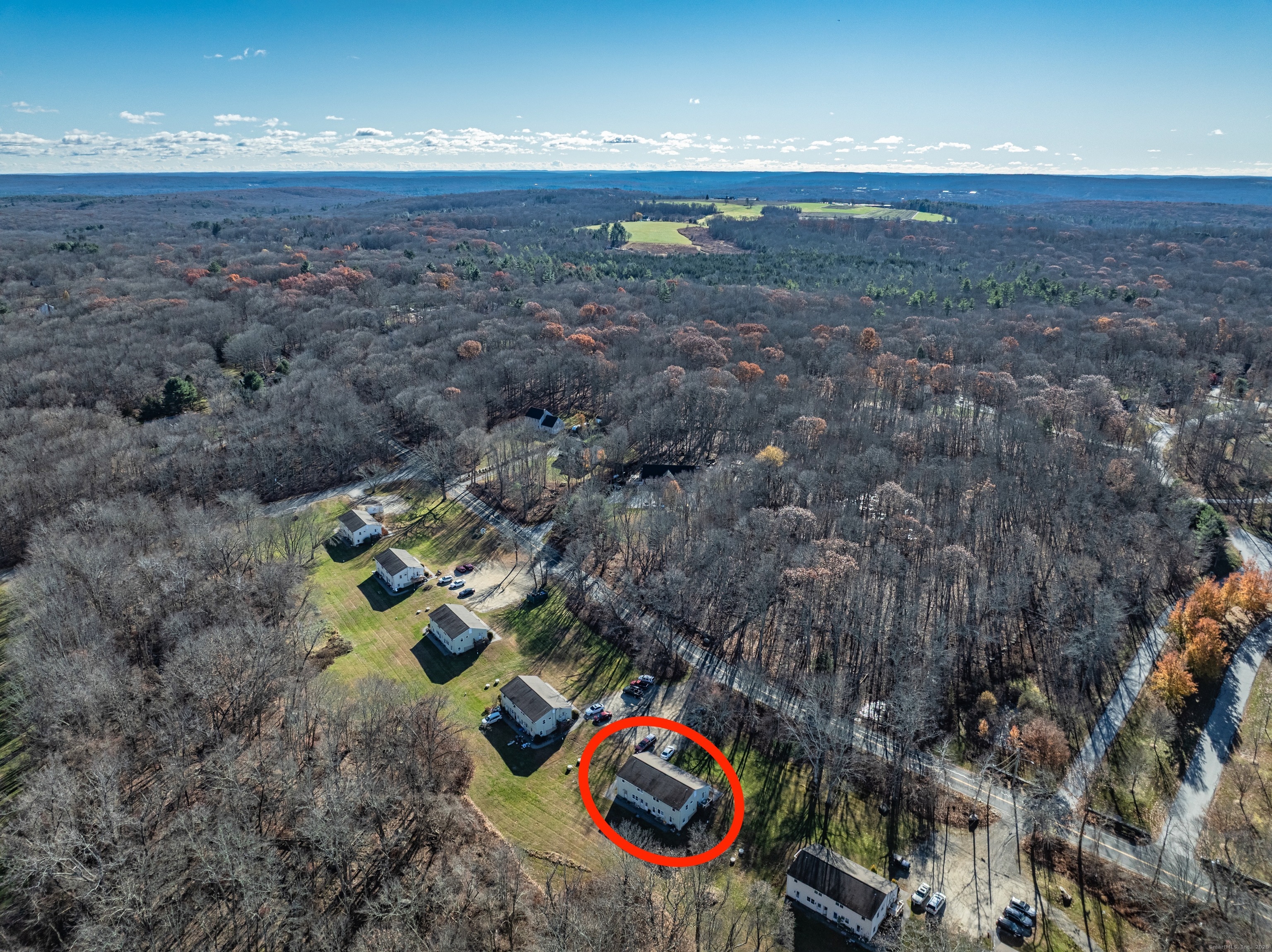 12 A White Oak Road, Unit 12A Mansfield, CT 06268 - Photo 22 of 24 an aerial view of a house with outdoor space