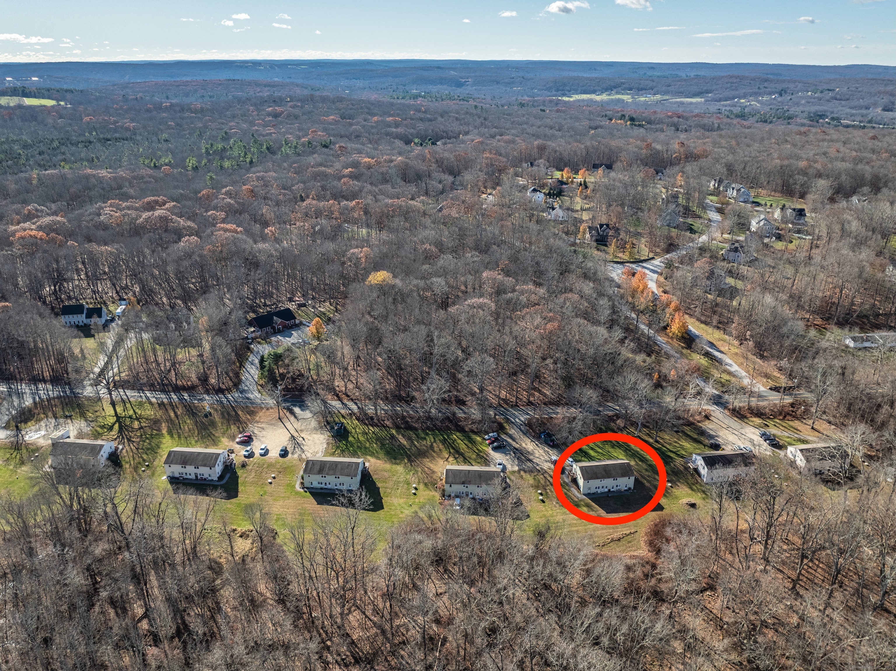 12 A White Oak Road, Unit 12A Mansfield, CT 06268 - Photo 24 of 24 an aerial view of a house with a yard