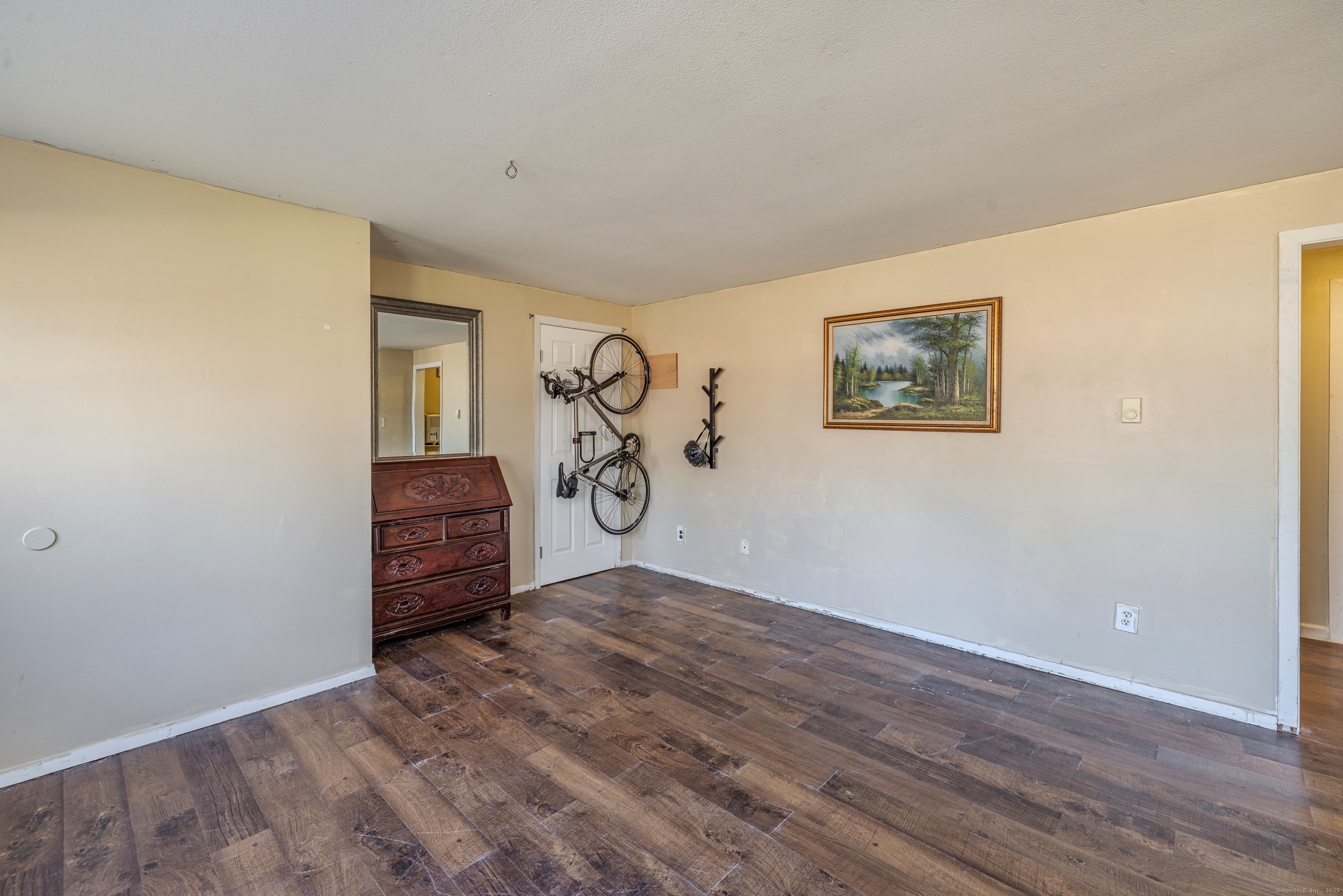 12 A White Oak Road, Unit 12A Mansfield, CT 06268 - Photo 8 of 24 a view of a room with wooden floor