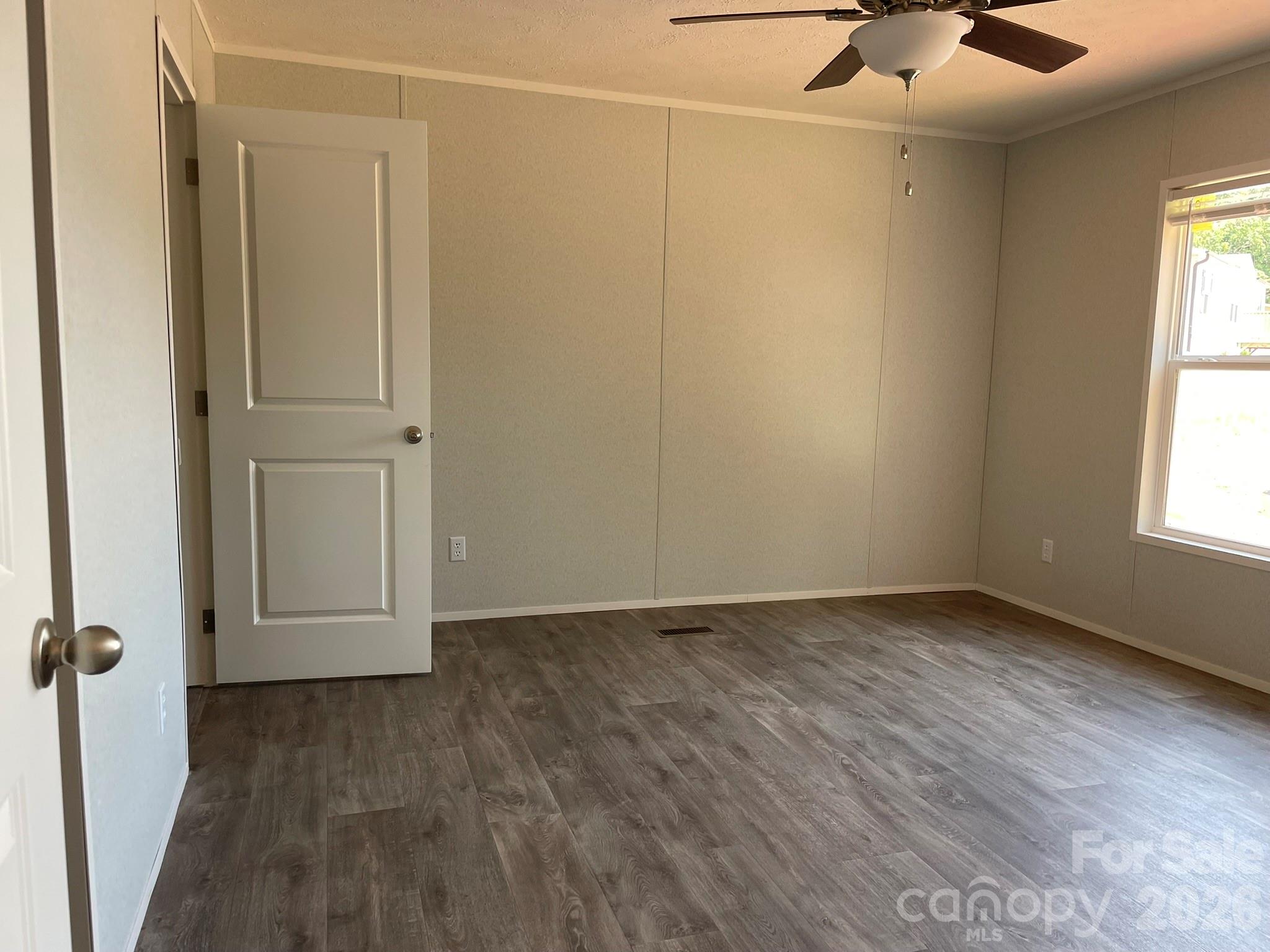 4188 Tallent Road Morganton, NC 28655 - Photo 13 of 21 an empty room with a empty space and windows