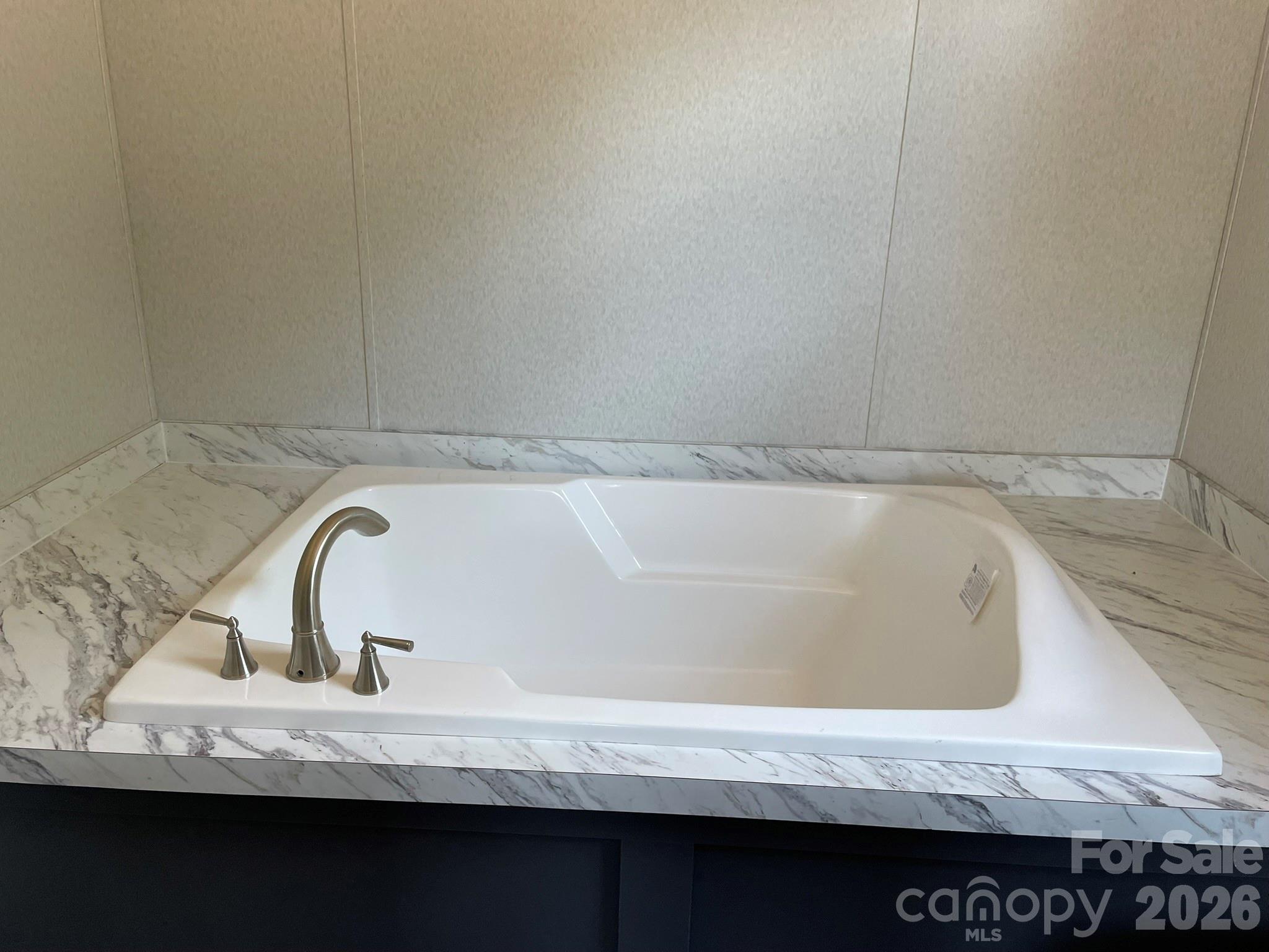 4188 Tallent Road Morganton, NC 28655 - Photo 15 of 21 a bathroom with a granite countertop and sink