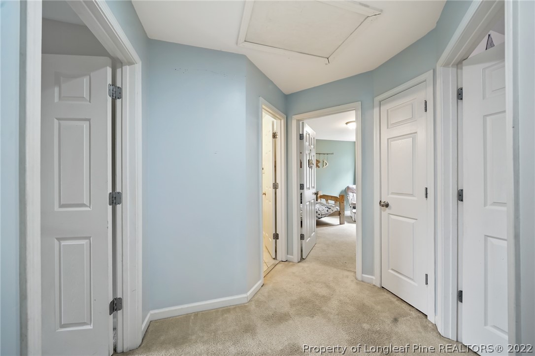 85 Pender Road Spring Lake, NC 28390 - Photo 23 of 45 a view of a livingroom with tub and workspace