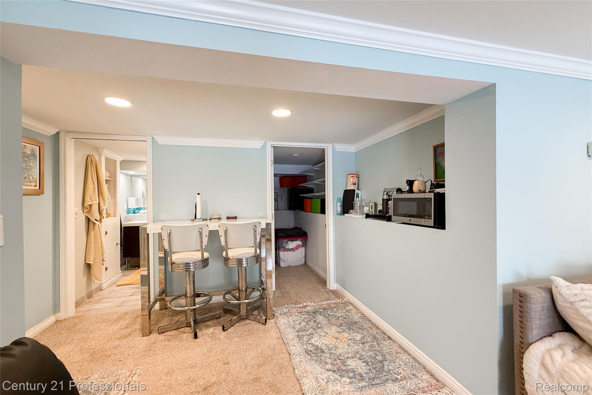 910 West Pine Tree Road West Lake Orion, MI 48362 - Photo 35 of 52 Carpeted dining area with ornamental molding and recessed lighting