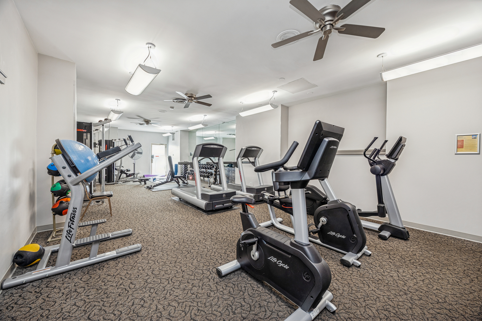 6301 North Sheridan Road, Unit 23J Chicago, IL 60660 - Photo 20 of 21 a view of a room with gym equipment
