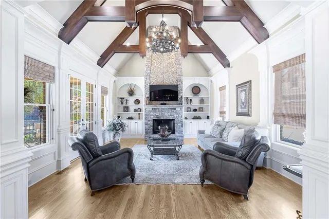 a living room with furniture or couch and a large window