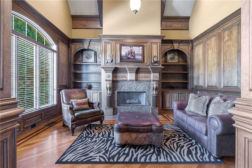 2145 Jones Phillips Road Dacula, GA 30019 - Photo 24 of 98 a living room with furniture and a fireplace