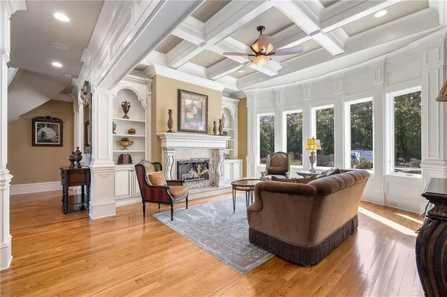 a bathroom with a shower sink and mirror